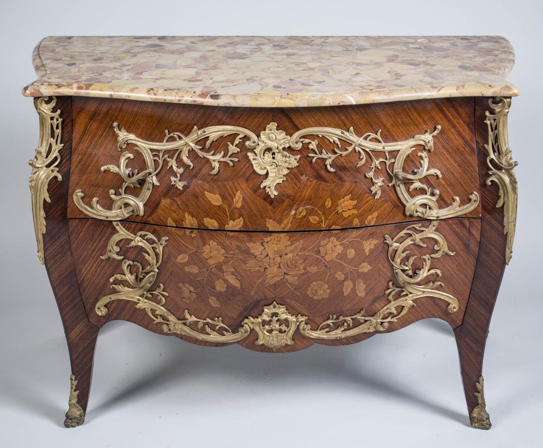 Louis XV Style Marble Top Commode: Serpentine fronted top over two drawers, cabriole legs ending in sabots. Height 33 inches, width 23 inches, depth 45 inches.