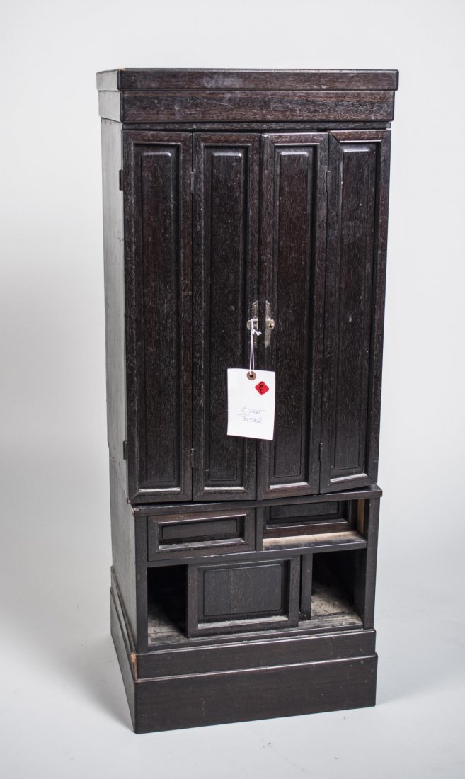 Japanese Hardwood Altar: Meiji period (1868-1912), pair of folding doors opening to an elaborately carved interior. Height 45 inches, width 28 inches, depth 18 inches.