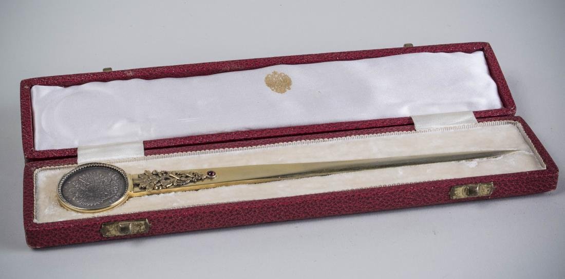 Russian Gilt Silver Letter Opener: Mounted with a 1913 (1) Rouble coin commemorating the 300th anniversary of the Romanov dynasty and depicting the first Romanov-tsar, Mihail Fjodorovits and the last Russian emperor Nicholas II who act