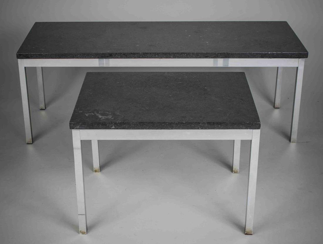 Set of Two Marble Top Chrome Tables: Comprising a coffee table and a side table each with a black marble top on a chrome base. Coffee table, height 17 inches, width 48 inches, depth 18 inches