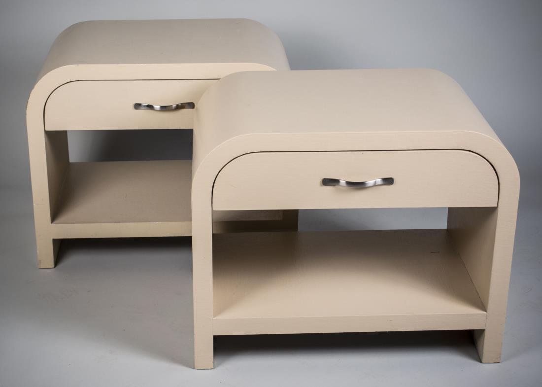 Pair of Karl Springer Style Linen Side Tables: Each with a single drawer above an open shelf. Height 26 inches, width 32 inches, depth 20 inches.