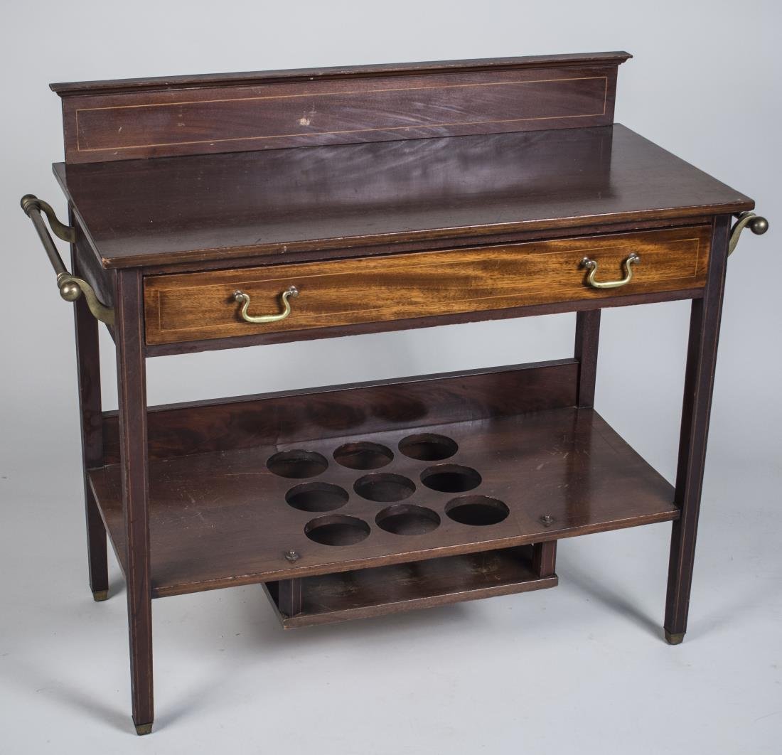Mahogany Bar Server: Rectangular top with inlaid backsplash, over a long drawer, square tapered legs, joined by a lower shelf. Height 36 inches, width 40 inches, depth 19 inches.