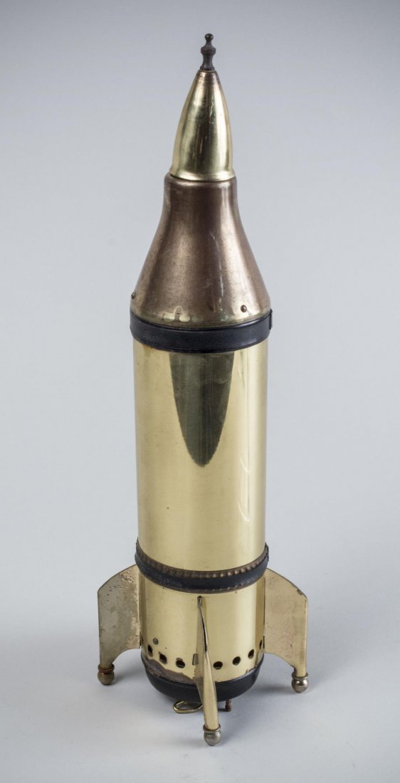 Brass US Rocket Ship Decanter - Music Box: Brass, plays Moonlight Sonata. Height 13 1/2 inches.