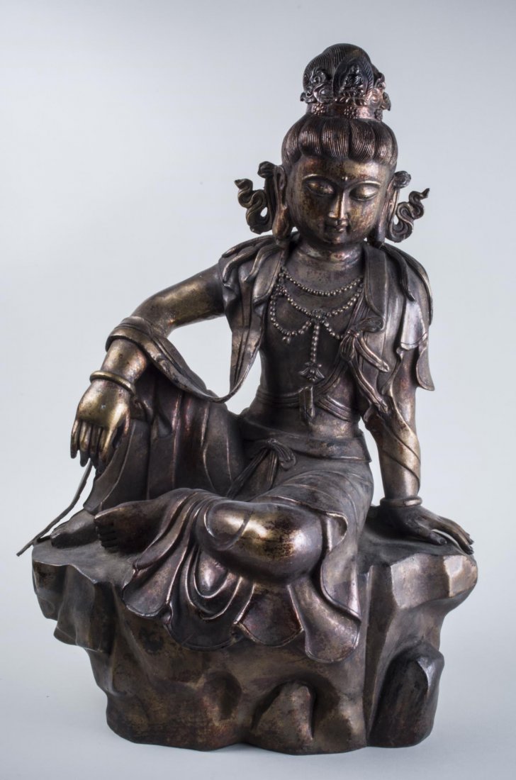 Chinese Gilt Bronze Buddha: Modeled seated. Marked Ming Dynasty. Height 26 1/2 inches.