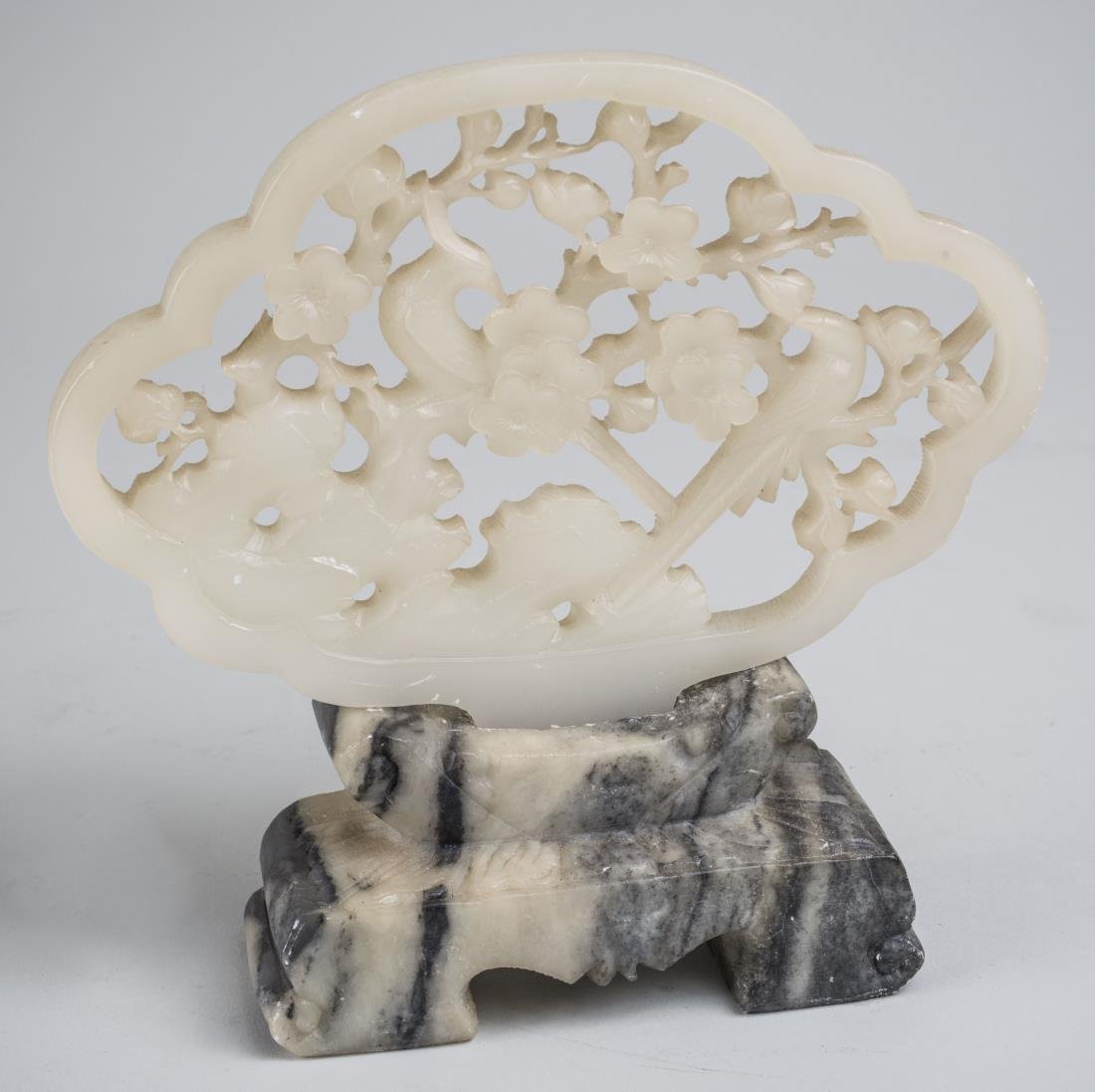 Chinese Carved Soapstone on Hardstone stand: Bird and floral decoration. Height 7 1/2 inches.