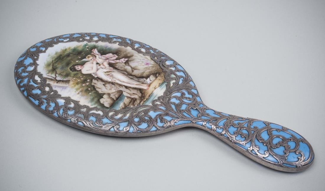 Alvin Sterling Mounted Hand Mirror: Allegorical scene painted on a sterling silver scroll mounted celeste blue dresser hand mirror