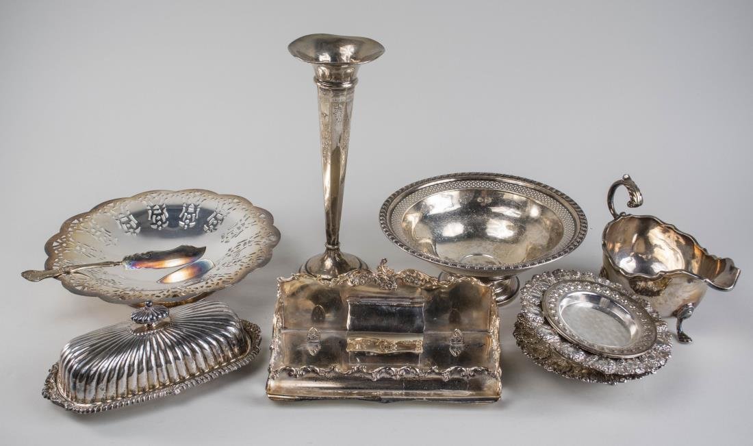 Group of Silver and Silver Plated Articles: Comprising an American weighted sterling silver vase, a Walker & Hall silver plated sauce boat, an inkstand, reticulated bowl, etc.