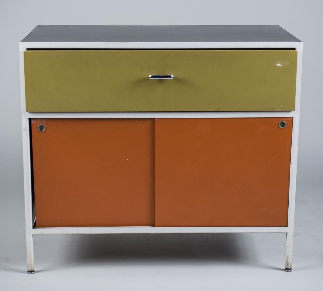 George Nelson for Herman Miller Cabinet: Single drawer over sliding doors, on metal frame with black laminate top. Herman Miller label. Height, 30 inches. Width 34 inches, Depth,17 inches.