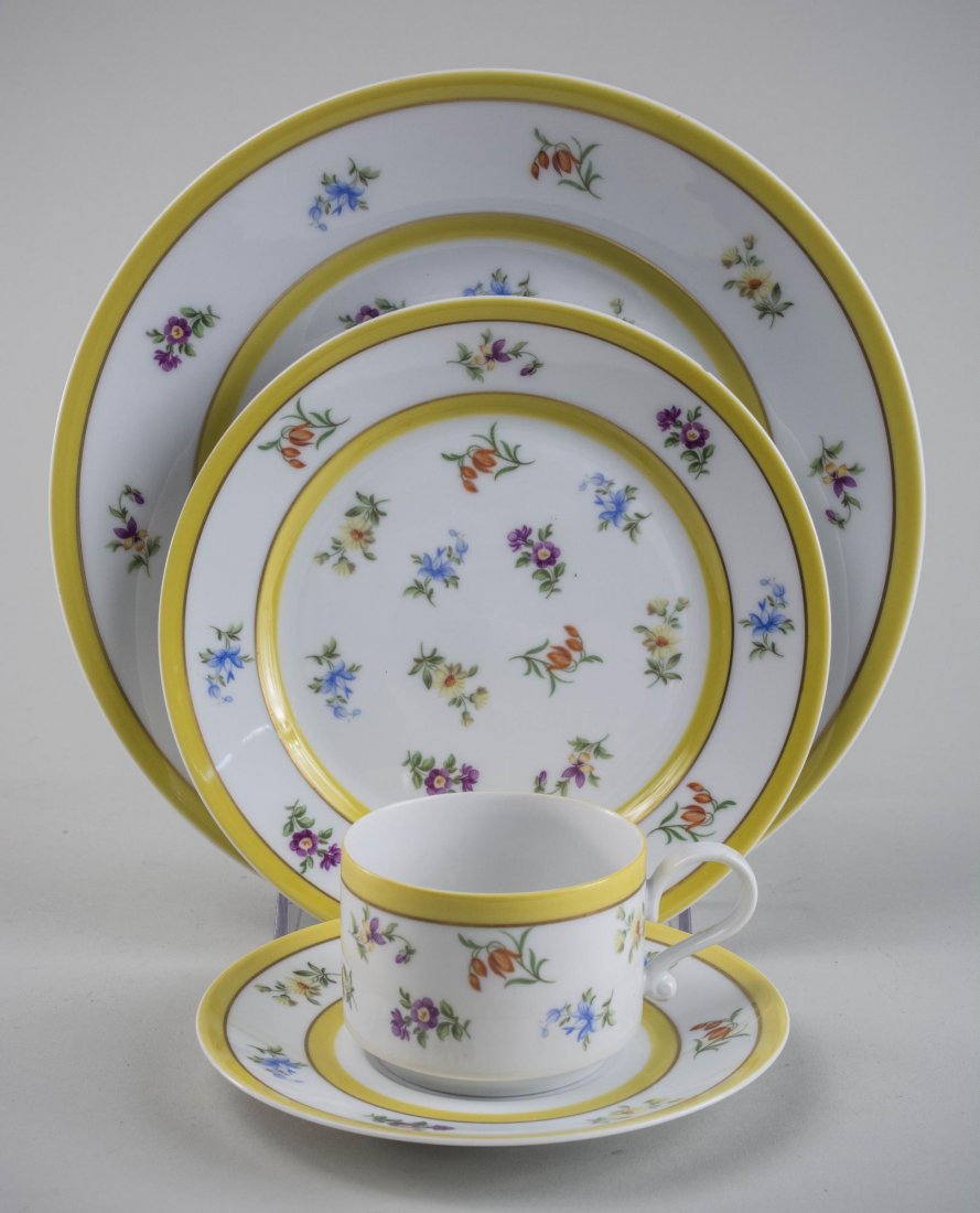 Heinrich Porcelain Dinner Service: Approximately forty one pieces, Grand Duchess pattern, comprising eight dinner plates, ten salad plates, twelve cups and eleven saucers. Dinner plate diameter 10 3/8 inches.
