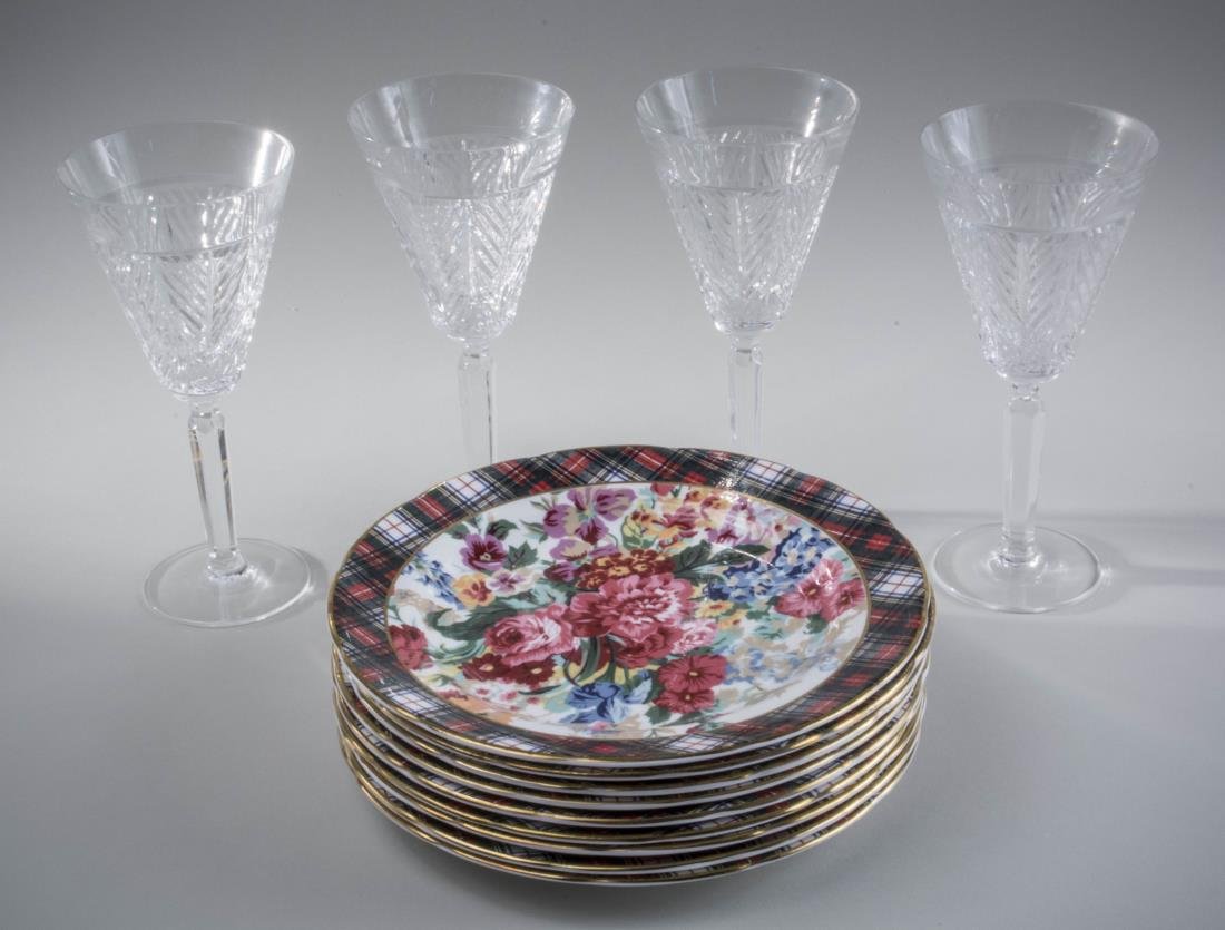 Ralph Lauren Plates and Glasses: Plates with polychrome floral decoration within a plaid border; together with four cut glass wine goblets. Plates, diameter 8 inches, glasses, height 7 1/4 inches.
