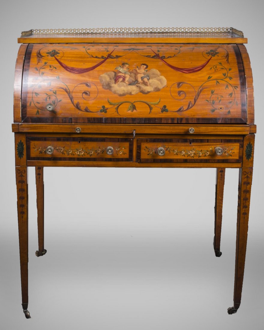 Edwardian Cylinder Desk: Polychrome painted fruitwood desk, the rectangular top with brass gallery, over a cylinder front opening to a fitted interior, square tapered legs. Height 41 inches, width 36 inches, depth 24 inches.