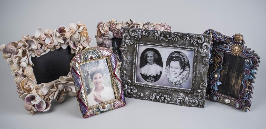 Group of Six Decorative Picture Frames: Including two with seashell decoration, two with mythical decoration, one with mirror mosaic decoration, and one with scroll and acanthus decoration. Largest 7 3/4 x 9 1/2 inches.