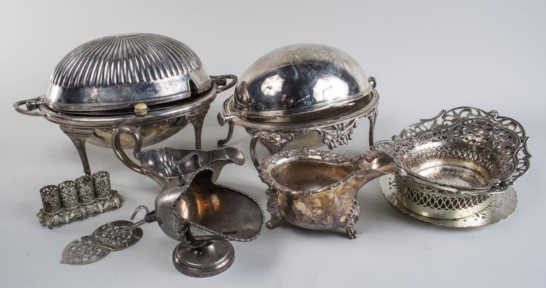 Group of Silver Plated Table Articles: Including two bacon dishes, two sauce boats, two reticulated dishes, a trivet, etc. Largest bacon dish, height 8 inches. Notice to bidders: Condition reports and additional photographs are provided by