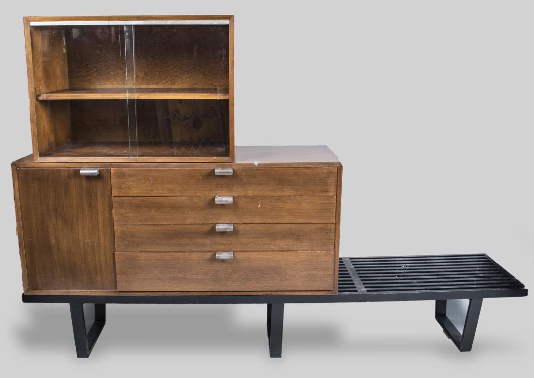 George Nelson Credenza: Modular design with a set of shelves with sliding glass doors, a set of four drawers flanked by a single side cabinet, and a bench form base. Height as shown 5 feet 2 inches, width 7 feet 8 1/4 inches