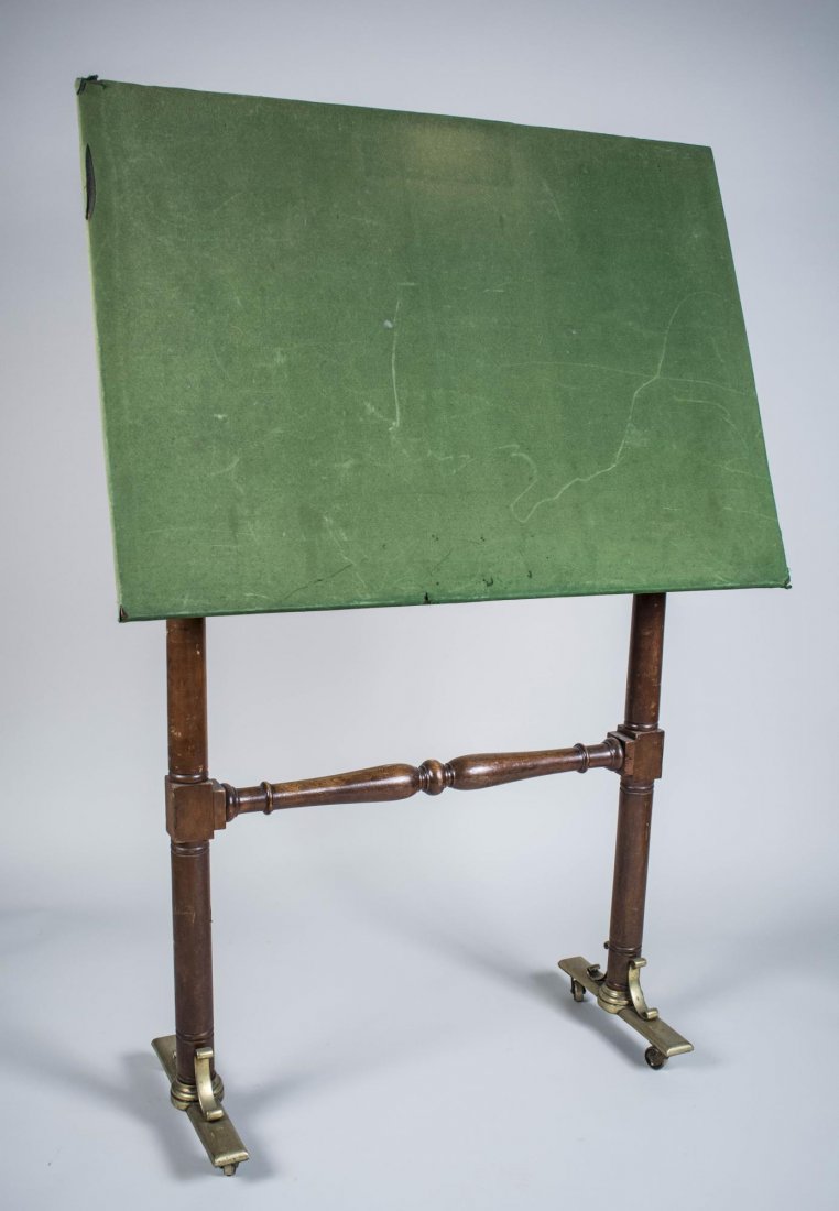 Victorian Drafting Table: Rectangular green baize covered table top on mahogany turned supports. Height 5 feet 9 inches, width 47 inches, depth 16 inches. Notice to bidders: Condition reports and additional photographs are pro