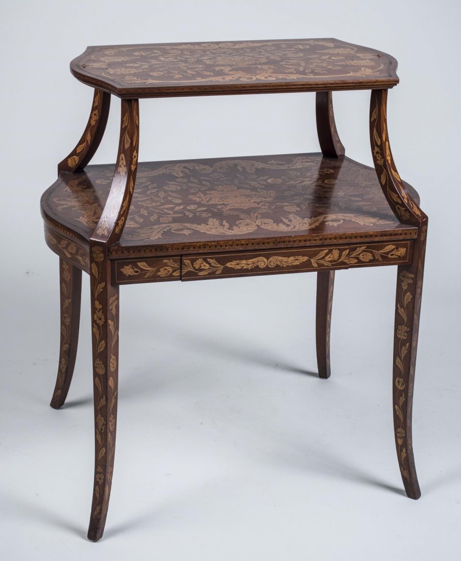 Dutch Marquetry Two Tier Tea Table: Shaped rectangular marquetry top on scrolled supports, over a conforming lower shelf above a drawer and two brushing slides, slightly cabriole legs. Height 32 inches, width 28 1/2 inches, depth 19 inc