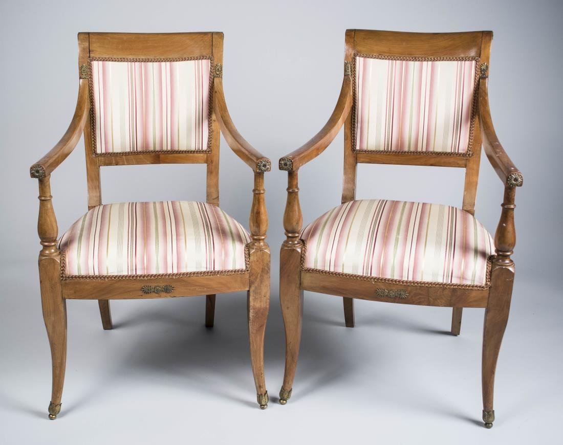 Pair of Ormolu Mounted Fruitwood Armchairs: Tablet crest rails, upholstered backs and seats downsloped arms on turned supports with ormolu accents, slightly splayed legs terminating in sabots, silk upholstery. Height 35 inches, width 21 inches,