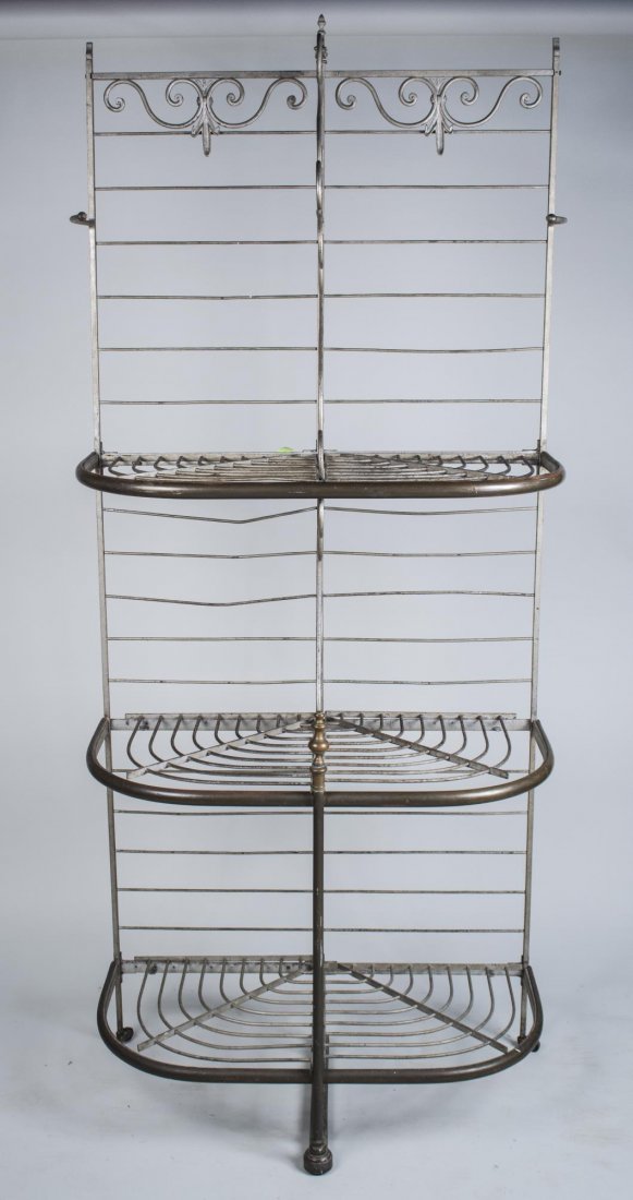 French Scrolled Iron Baker's Rack: Signed Paris, on bottom stretcher, three open shelves. Height 7 feet 7 inches, width 39 inches, depth 19 inches. Notice to bidders: Condition reports and additional photographs are provided by request