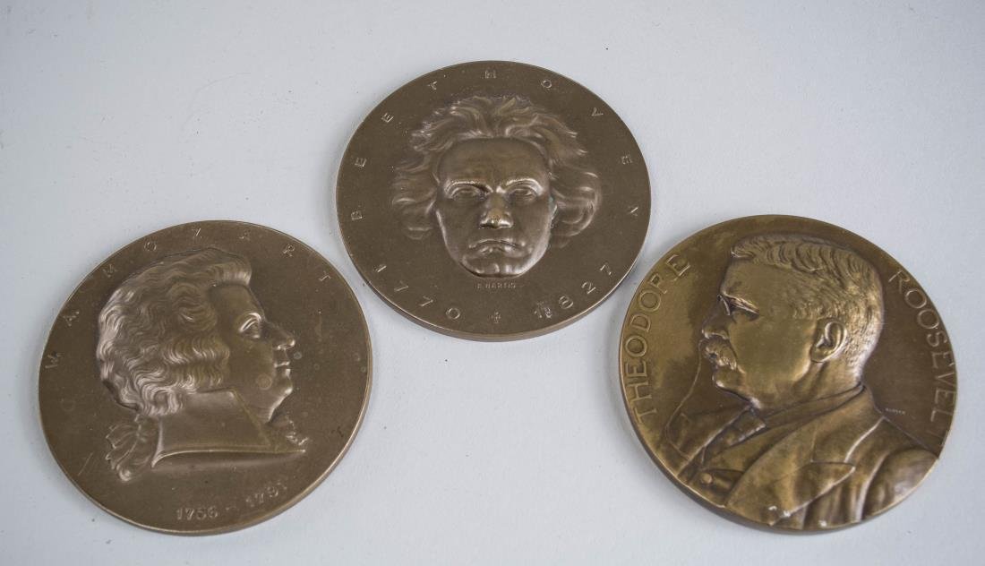 Three Bronze Medallions: Comprising Wolfgang Amedeus Mozart, Ludwig Beethoven and Theodore Roosevelt. All, diameter 3 inches. Notice to bidders: Condition reports and additional photographs are provided by request as a courte
