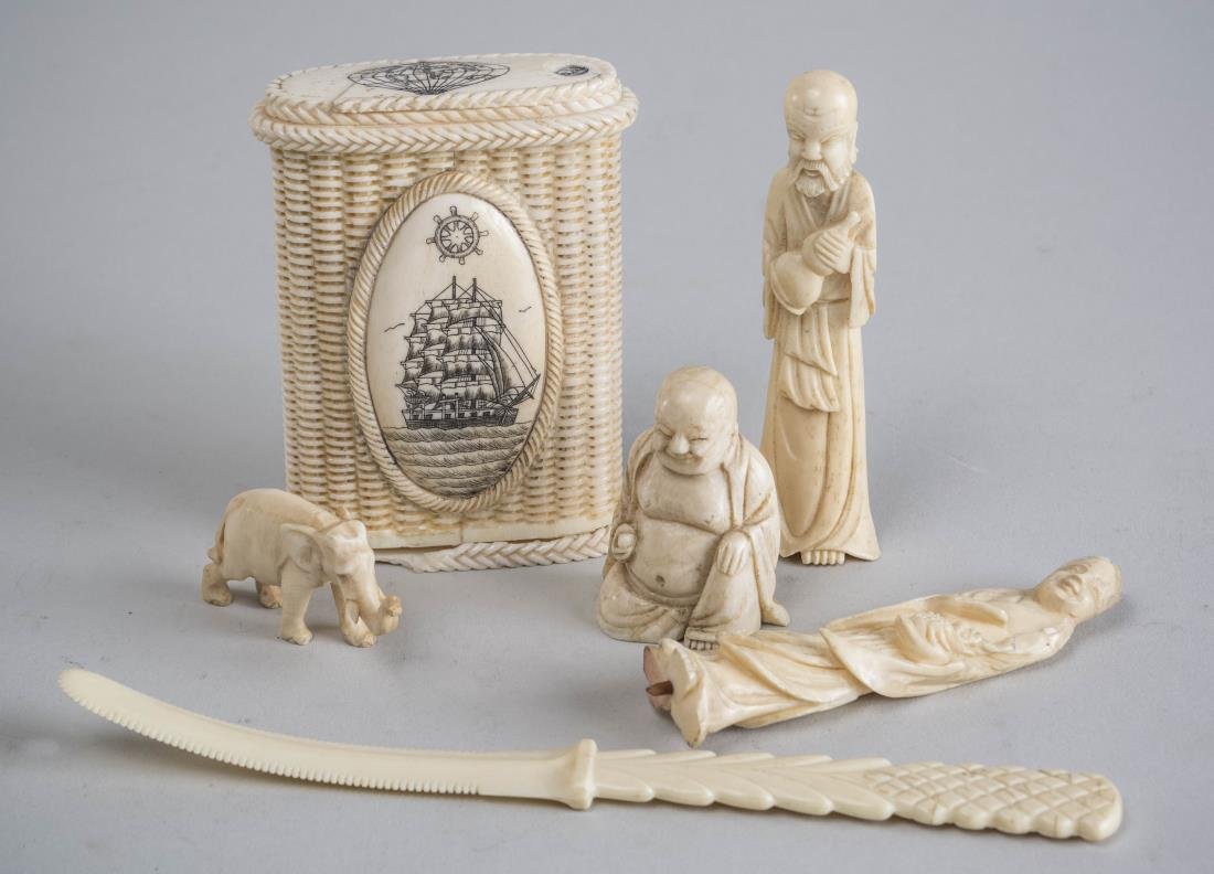Group of Bone Decorations: Including a basketweave snuff box with scrimshaw decoration, a letter opener, three figures. Letter opener, length 6 3/4 inches. Notice to bidders: Condition reports and additional photographs are pro