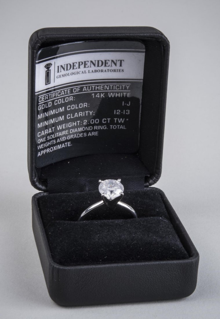 Diamond Solitaire Ring *: 14k white gold ring with a round diamond weighing approximately 2.0 carats. Size 7 1/2. Notice to bidders: Condition reports and additional photographs are provided by request as a courtesy to our cli