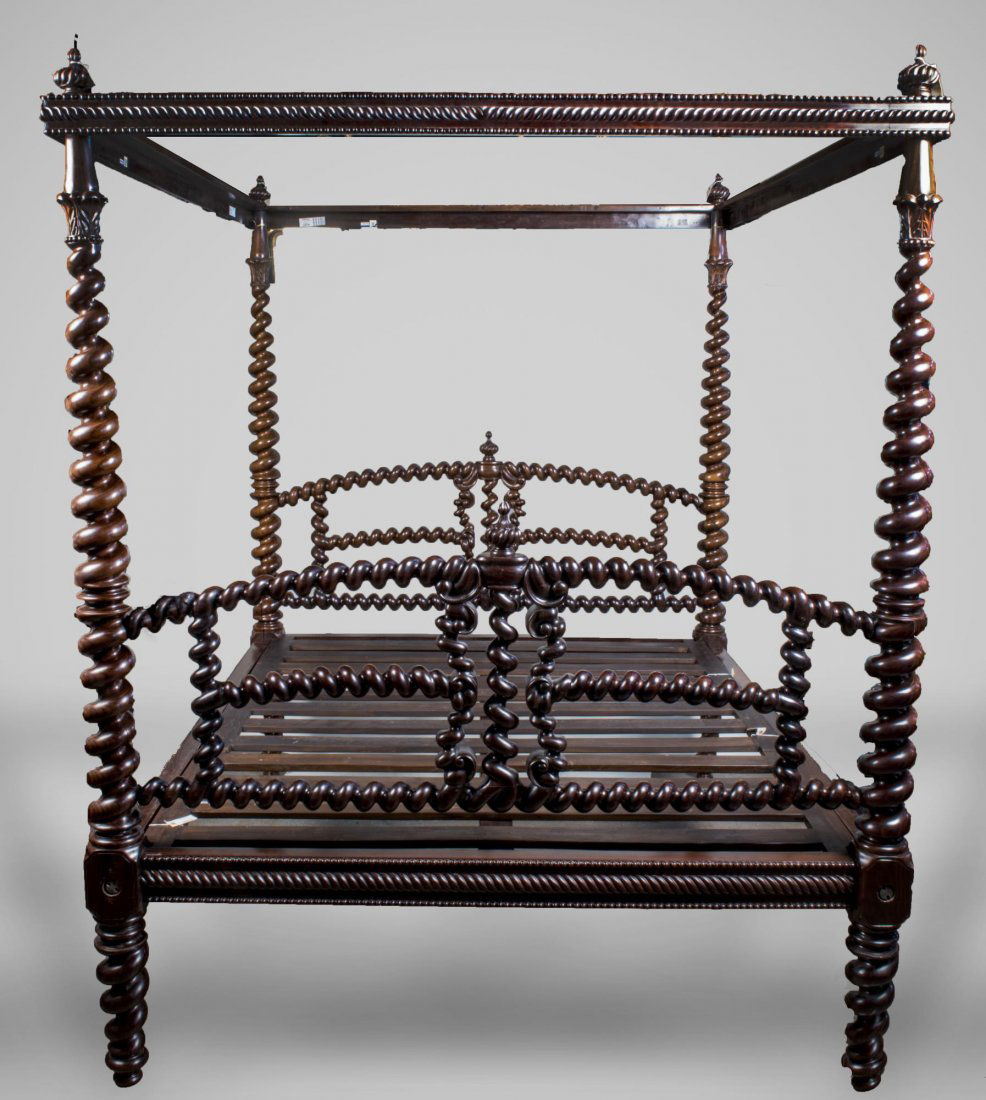 Anglo Indian Rosewood Four Poster Bed: With barley twist supports, footboard and headboard. Height 8 feet, width 6 feet 5 inches, depth 7 feet 7 inches. Provenance: Estate of Kenneth Battelle (Note: Pictured in Architectural Digest.) Notic