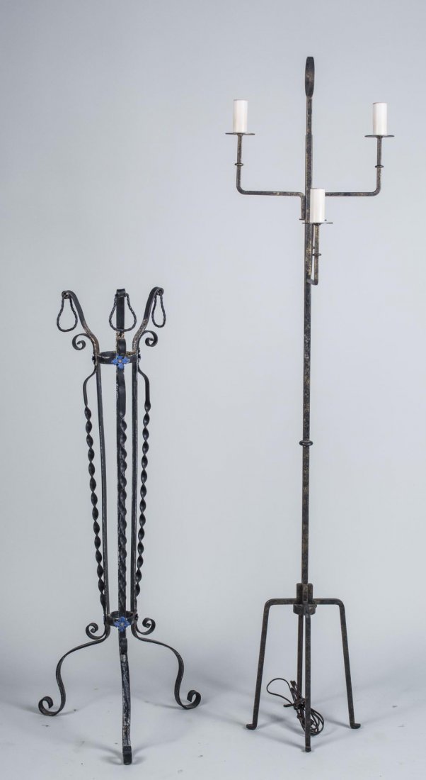 Wrought Iron Floor Lamp and Plant Stand: Floor lamp with four angular candle lights; together with a plant stand with basket top on twisted iron supports on a tripod base. Lamp, height 65 inches. Notice to bidders: Condition reports and addi