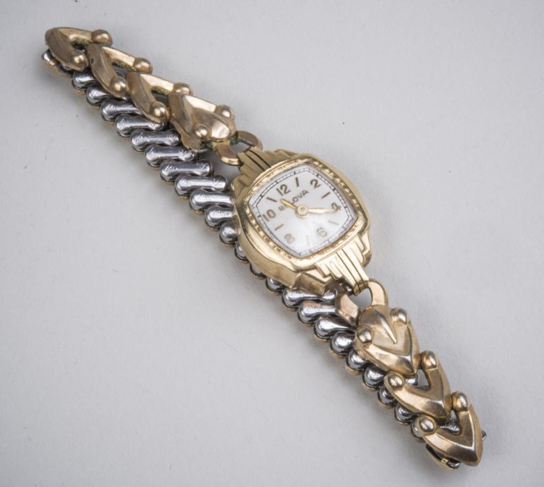 Lady's Gold Wristwatch *: 14k yellow gold Bulova watch. Notice to bidders: Condition reports and additional photographs are provided by request as a courtesy to our clients, as such any condition report is only an opinion and