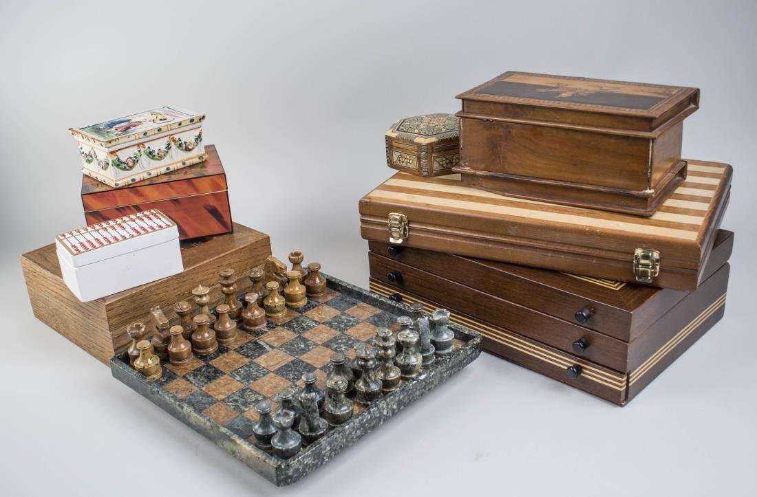 Backgammon & Chess Sets & Boxes: Comprising a carved hardstone chess set, a backgammon set, five decorative boxes including a Syrian style inlaid box, a jewelry box, and a humidor. Jewelry box height 4 1/2 inches, width 14 inches, de