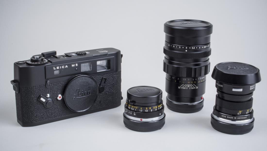Leica Camera and Lenses *: Comprising a M5 body and three summicron lenses including a 90mm f2, a 50mm f2, and a 35mm f2. Notice to bidders: Condition reports and additional photographs are provided by request as a courtesy to 