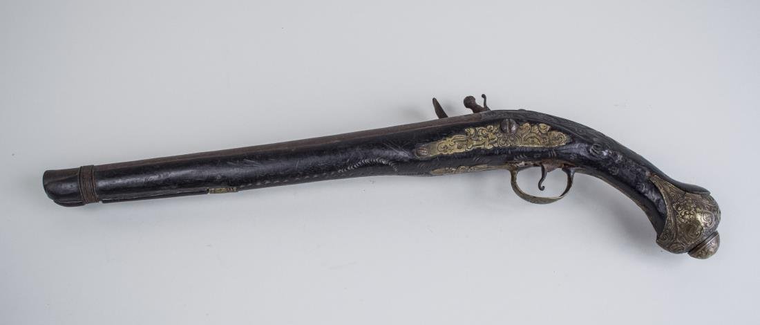 Continental Flintlock Pistol: Likely 18th/19th century French cavalry. Brass mounted trigger guard, side plate, and pommel. Barrel length 12 1/2 inches, overall 19 inches. Notice to bidders: Condition reports and additional photog