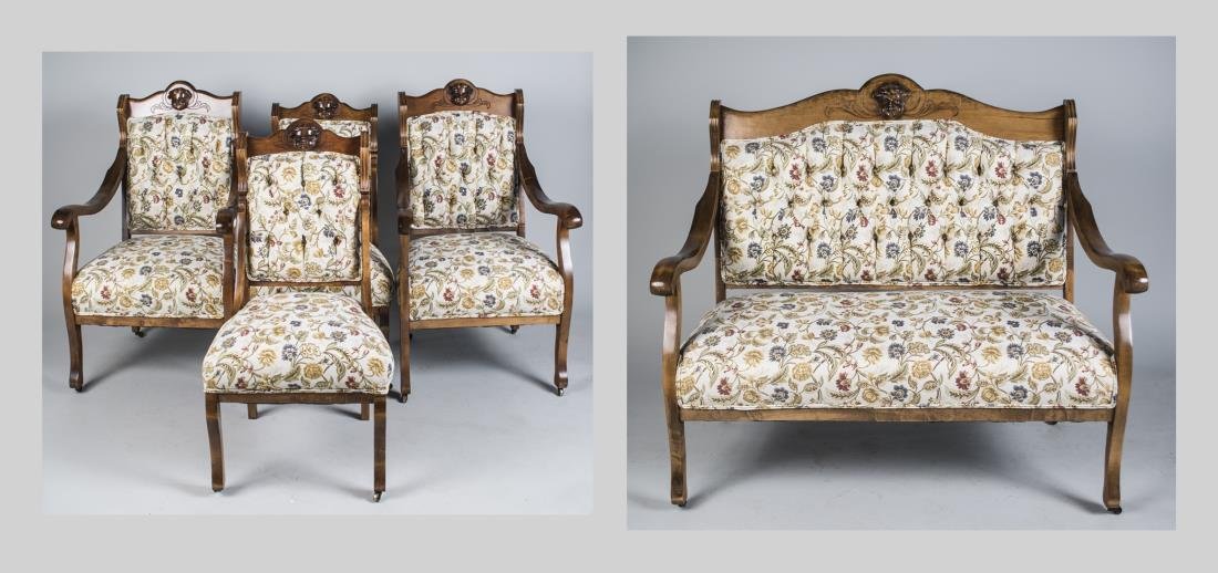 Suite of Seat Furniture: Comprising a settee, two armchairs and two side chairs, all upholstered with flowering vines on white background.. Height 40 inches, width 48 inches, depth 27 inches. Notice to bidders: Condition repo