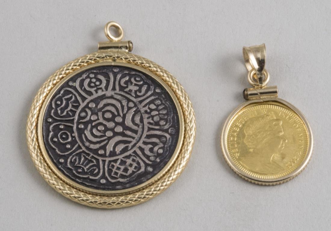 English Gold Coin: Isle of Man 'Angel' coin dated 2005; together with a Tibet Tangka 1 1/2 Sho coin, both mounted in a gold frame. Notice to bidders: Condition reports and additional photographs are provided by request 