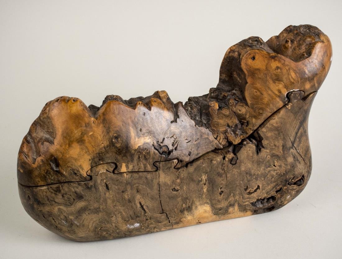 Richard Rothbard Puzzle Box: Natural form. Height 8 1/2, width14 inches. Notice to bidders: Condition reports and additional photographs are provided by request as a courtesy to our clients, as such any condition report is only a