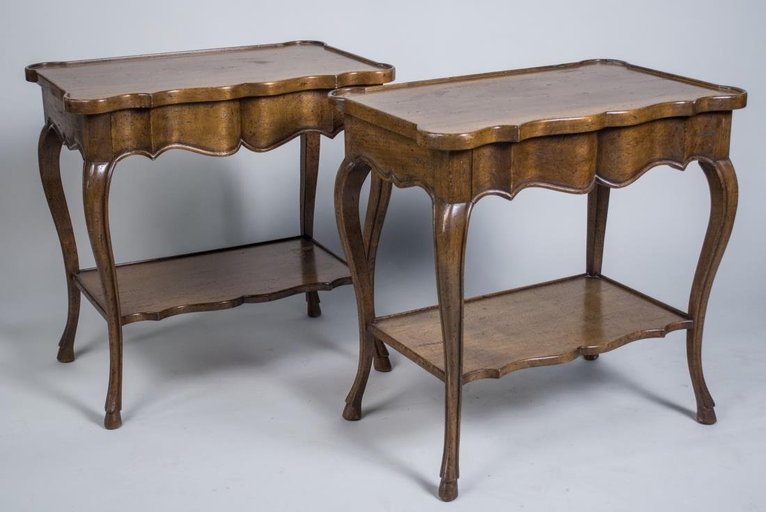 Pair of Fruitwood Side Tables: Designed by William Switzer, each with rectangular top with outset rounded corners over a single long drawer, cabriole legs ending in hoof feet. Height 28 inches, width 29 inches, depth 18 inches. Not