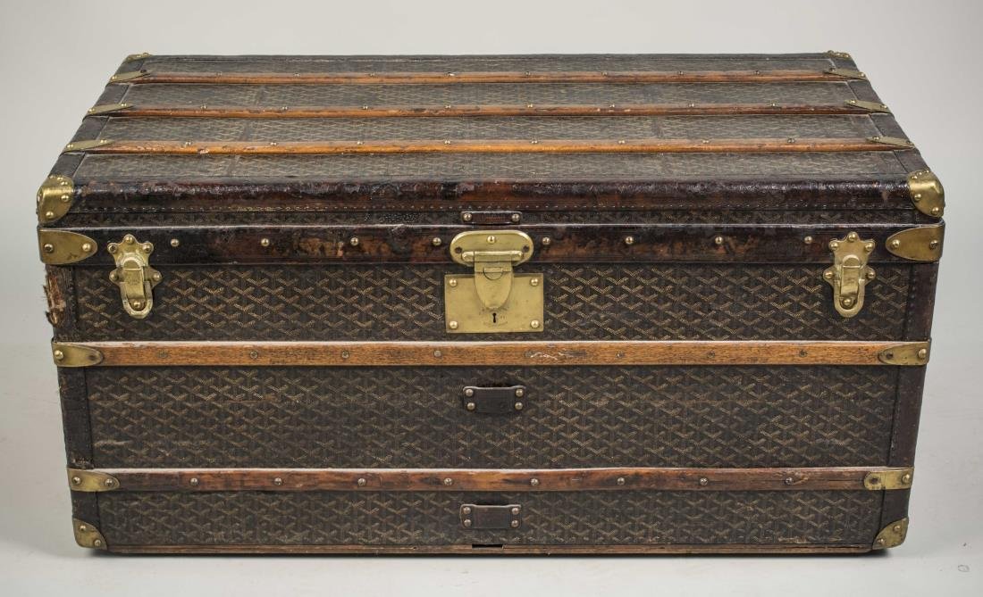 Goyard Steamer Trunk: Wood spines, original brass hardware, bearing internal label. Height 19 inches, width 39 inches, depth 21 inches. Notice to bidders: Condition reports and additional photographs are provided by reques