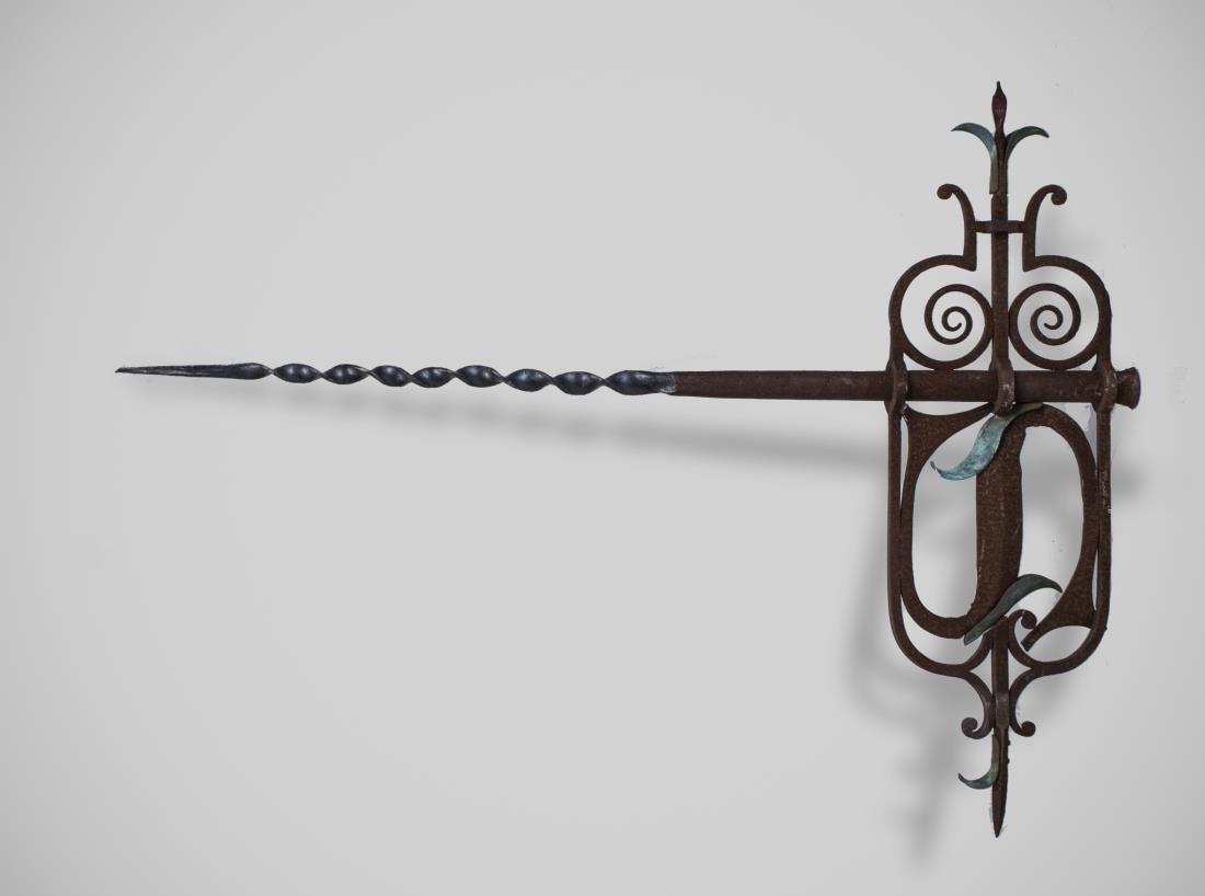 Cast Iron Sign: Scroll, leaf, and the letter 'S' decoration. 36 x 48 inches. Notice to bidders: Condition reports and additional photographs are provided by request as a courtesy to our clients, as such any condition