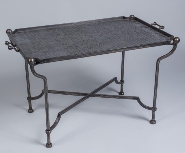 Steel Tray Top Table: Circa 1950. Height 19 inches, width 33 inches, depth 20 inches. Notice to bidders: Condition reports and additional photographs are provided by request as a courtesy to our clients, as such any condit