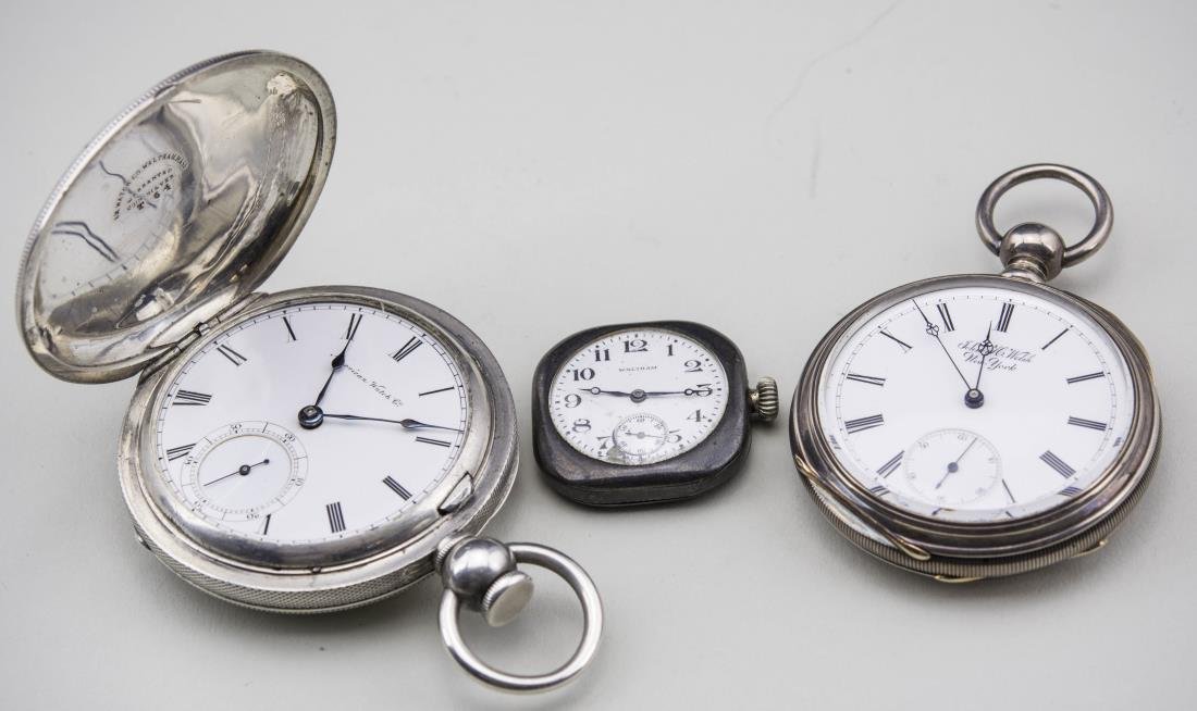 Three American Pocket Watches: (1) American Coin Silver Hunt Case Key Wind Pocket Watch with enamel dial with Roman numerals, signed American Watch Co., subsidiary seconds dial, movement signed P.S. Bartlett Waltham Mass. #532202, 