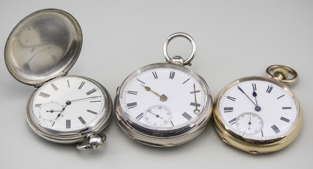 Three English Pocket Watches: (1) English Hunt Case Key Wind Pocket Watch circa 1834, enamel dial with Roman numerals, subsidiary seconds dial, movement signed Robert Roskell, Liverpool, #7502, case #7502, diameter 1 ½ inches; (2