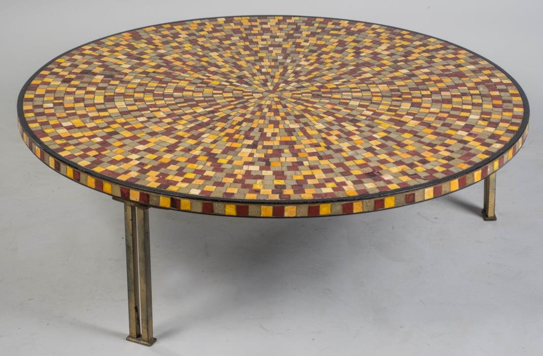 Mosaic Top Coffee Table: Circular top on three metal legs. Height 14 inches, diameter 42 inches. Notice to bidders: Condition reports and additional photographs are provided by request as a courtesy to our clients, as such an