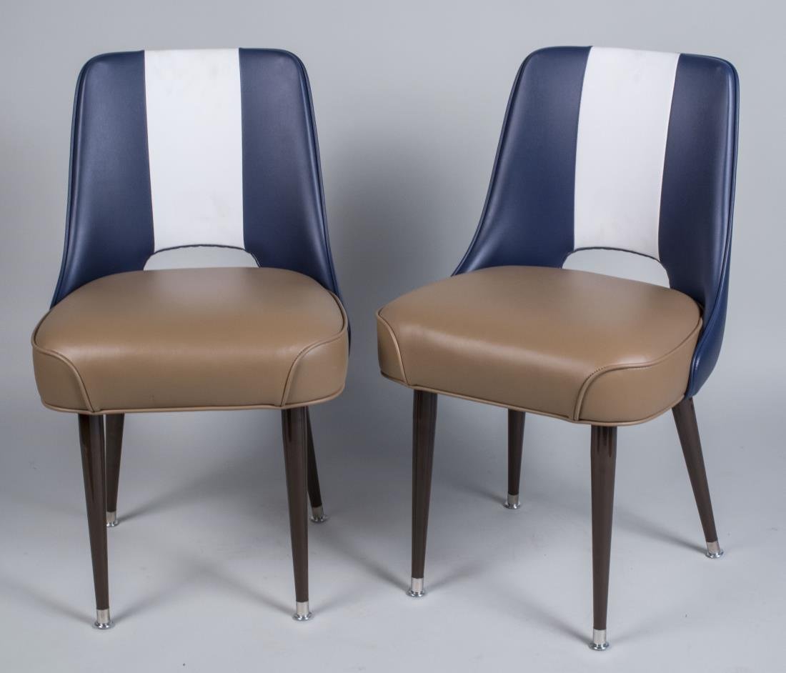 Two Chairs: Navy blue and white upholstered backs, light brown upholstered seats, tapered legs. Height 33 inches, width 19 inches, depth 18 inches. Notice to bidders: Condition reports and additional photographs