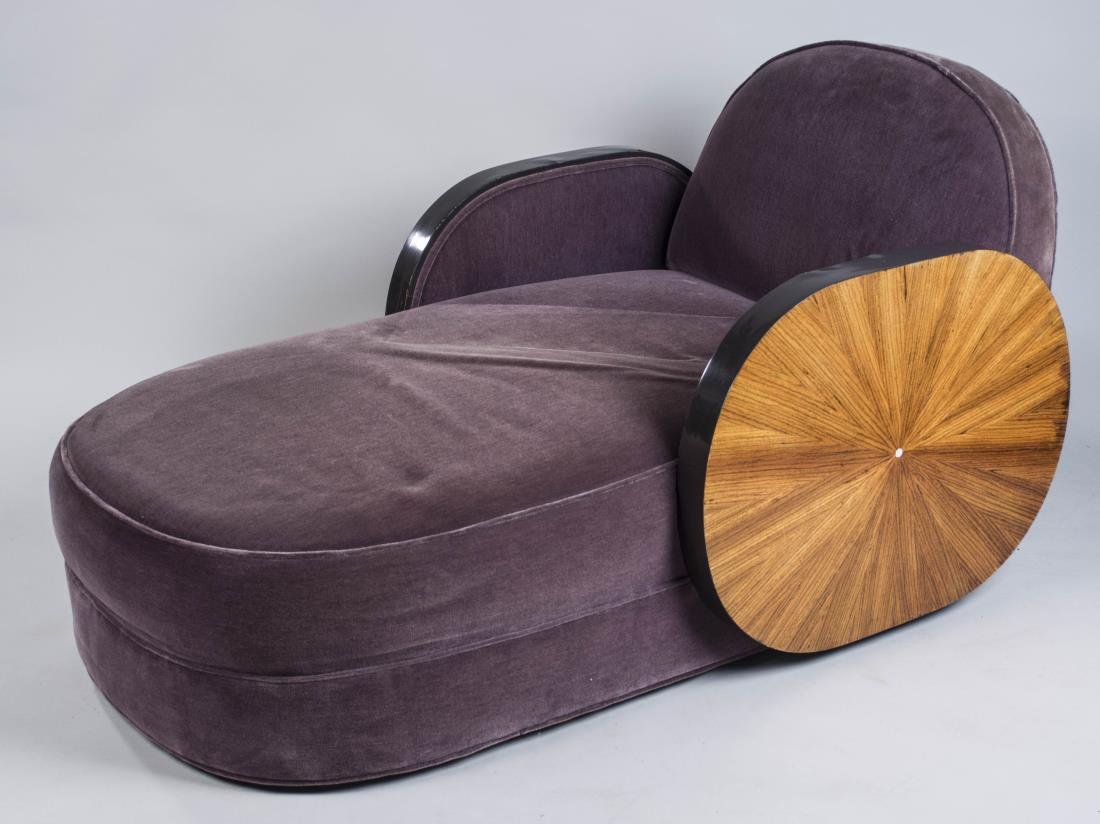 Chaise Longue: Purple velvet upholstery, exotic wood oval side/arms. Height 31 inches, width 35 inches, depth 62 inches. Notice to bidders: Condition reports and additional photographs are provided by request as a c