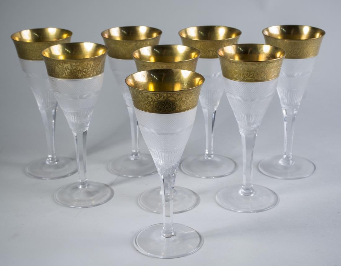 Set of Eight Moser Wine Glasses: In the 'Splendid Gold' pattern. Height 7 3/4 inches. Notice to bidders: Condition reports and additional photographs are provided by request as a courtesy to our clients, as such any condition report 