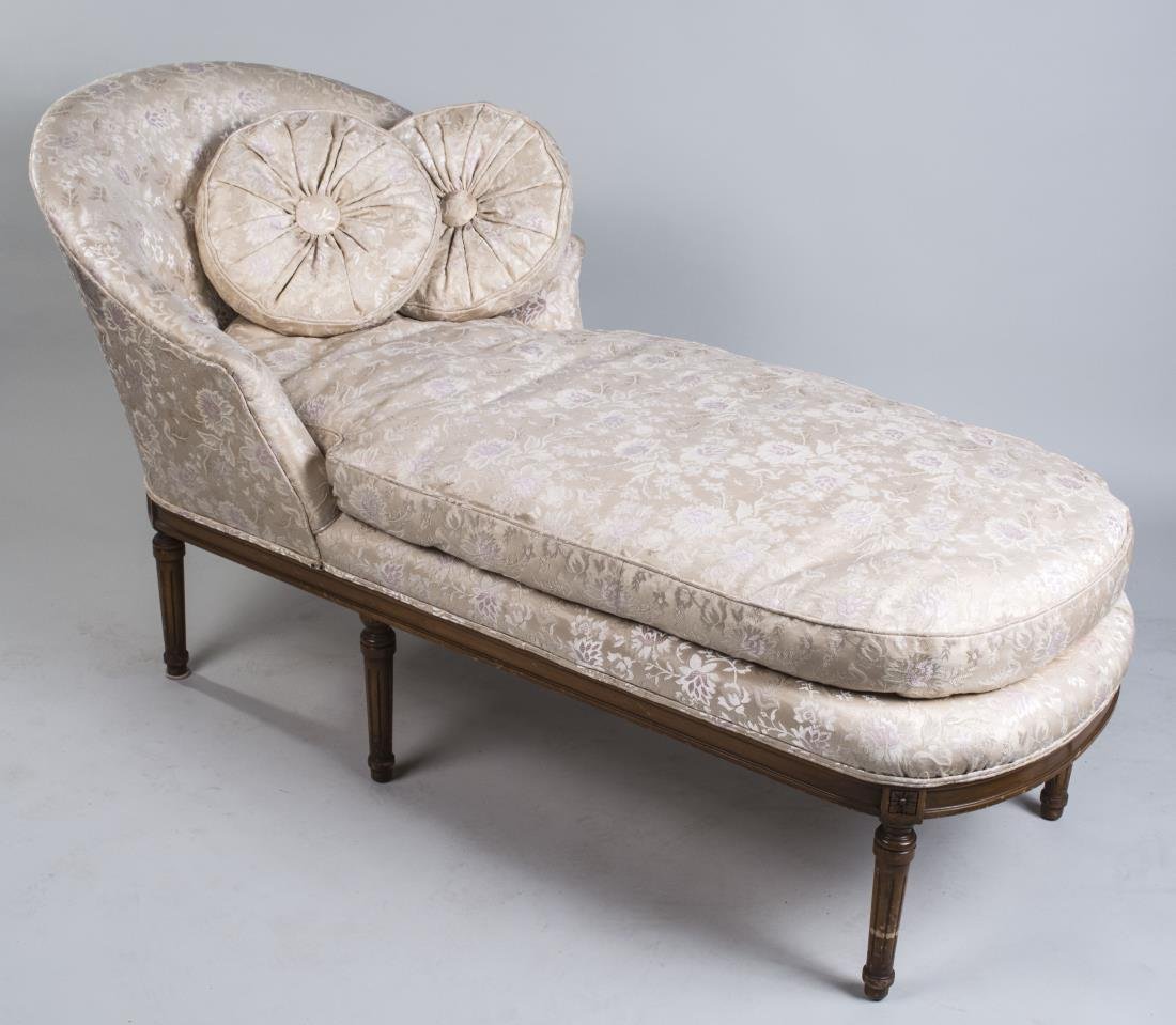 Chaise Longue: Neoclassical style, ivory damask upholstered chaise with tapered fluted legs. Height 33 inches, width 31 inches, length 62 inches Notice to bidders: Condition reports and additional photographs are pr