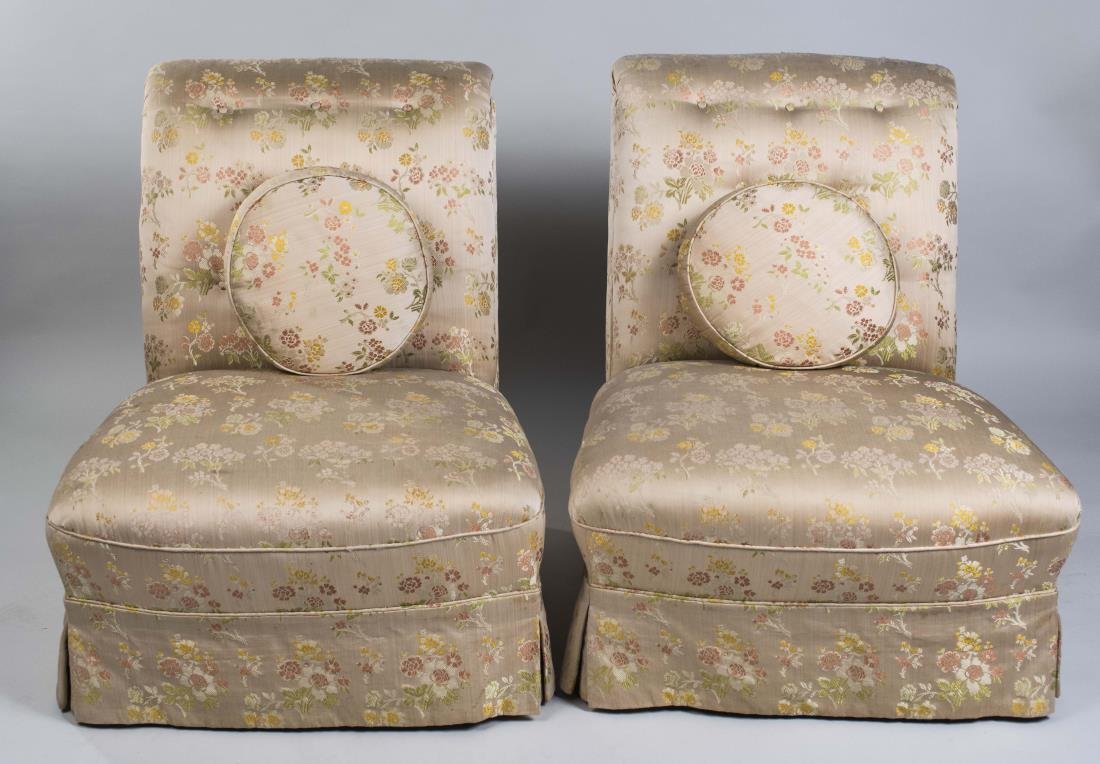 Pair of Slipper Chairs: Button tufted upholstered backs, polychrome floral decoration. Height 33 inches, width 28 inches, depth 36 inches. Notice to bidders: Condition reports and additional photographs are provided by reque