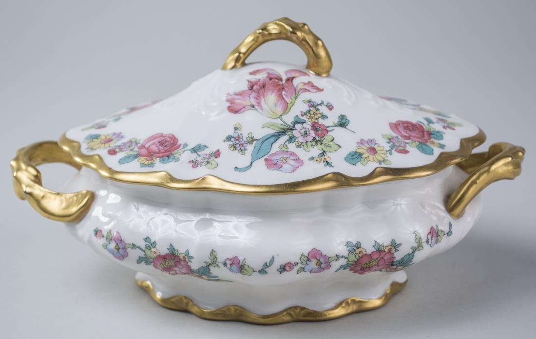 Russian LFZ Porcelain Tureen *: Oblong dish with polychrome floral decoration with gilt highlights. Height 5 inches. Notice to bidders: Condition reports and additional photographs are provided by request as a courtesy to our client