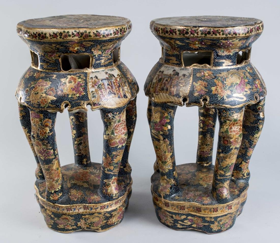 Pair of Asian Garden Seats: In the style of Nippon, with figural and floral decoration. Height 18 1/2 inches, diameter 11 inches. Notice to bidders: Condition reports and additional photographs are provided by request as a court