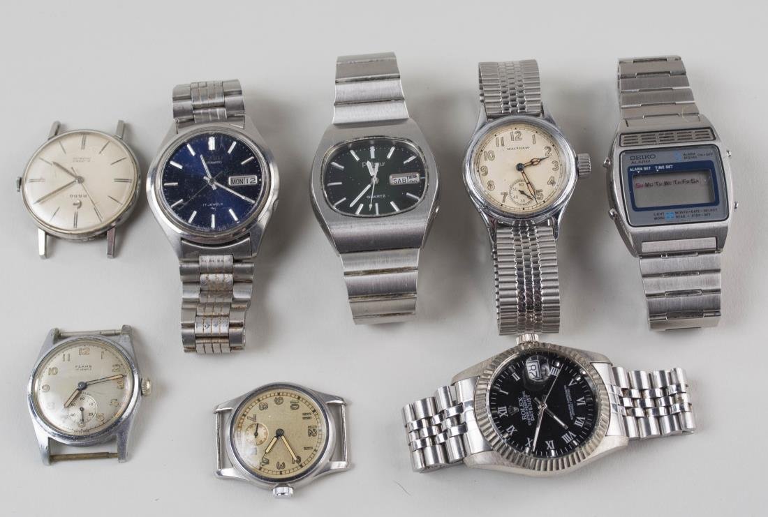 Group of Gentleman's Wristwatches: Various makers, including Rado, Pulsar, Waltham, two Seiko, a Rolex (reproduction), etc. Notice to bidders: Condition reports and additional photographs are provided by request as a courtesy to our cl