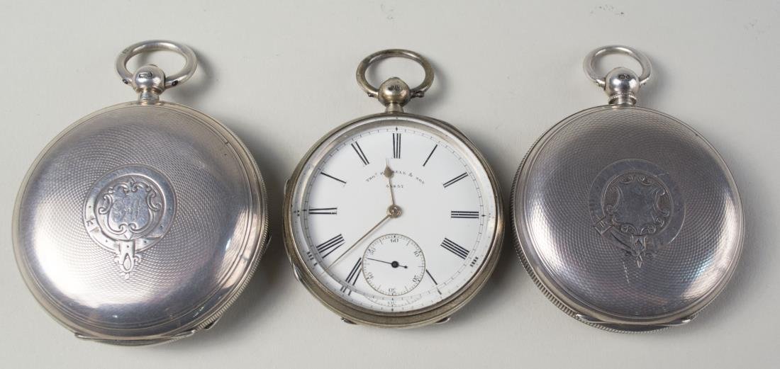 Three English Pocket Watches: (1) English silver hunt case key wind pocket watch circa 1900, with enamel dial with Roman numerals signed, Skeggs, 301 Mare St. Hackney, subsidiary seconds dial, movement signed Skeggs Watchmaker 301